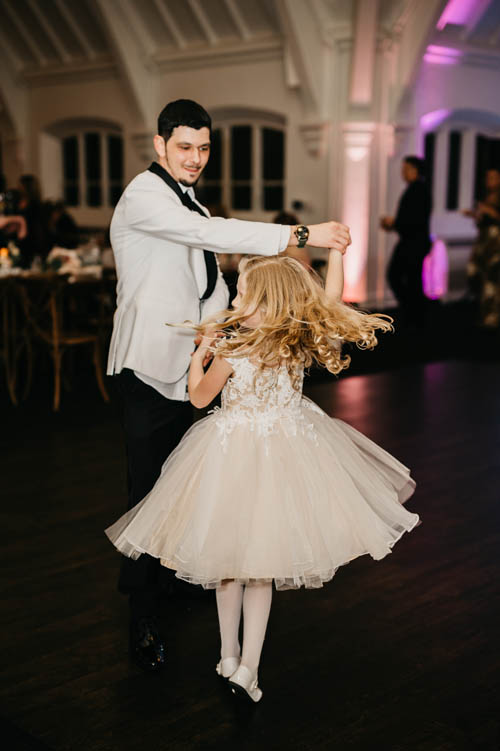 Little girl and gentleman dancing