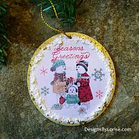 Snow Family Exchanging Presents Holiday Christmas Ornament